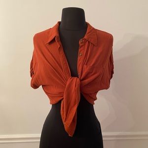 Copper button down short sleeve blouse.